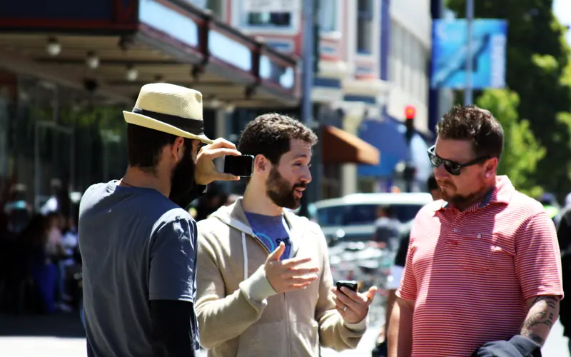 Group of men chatting on a city street